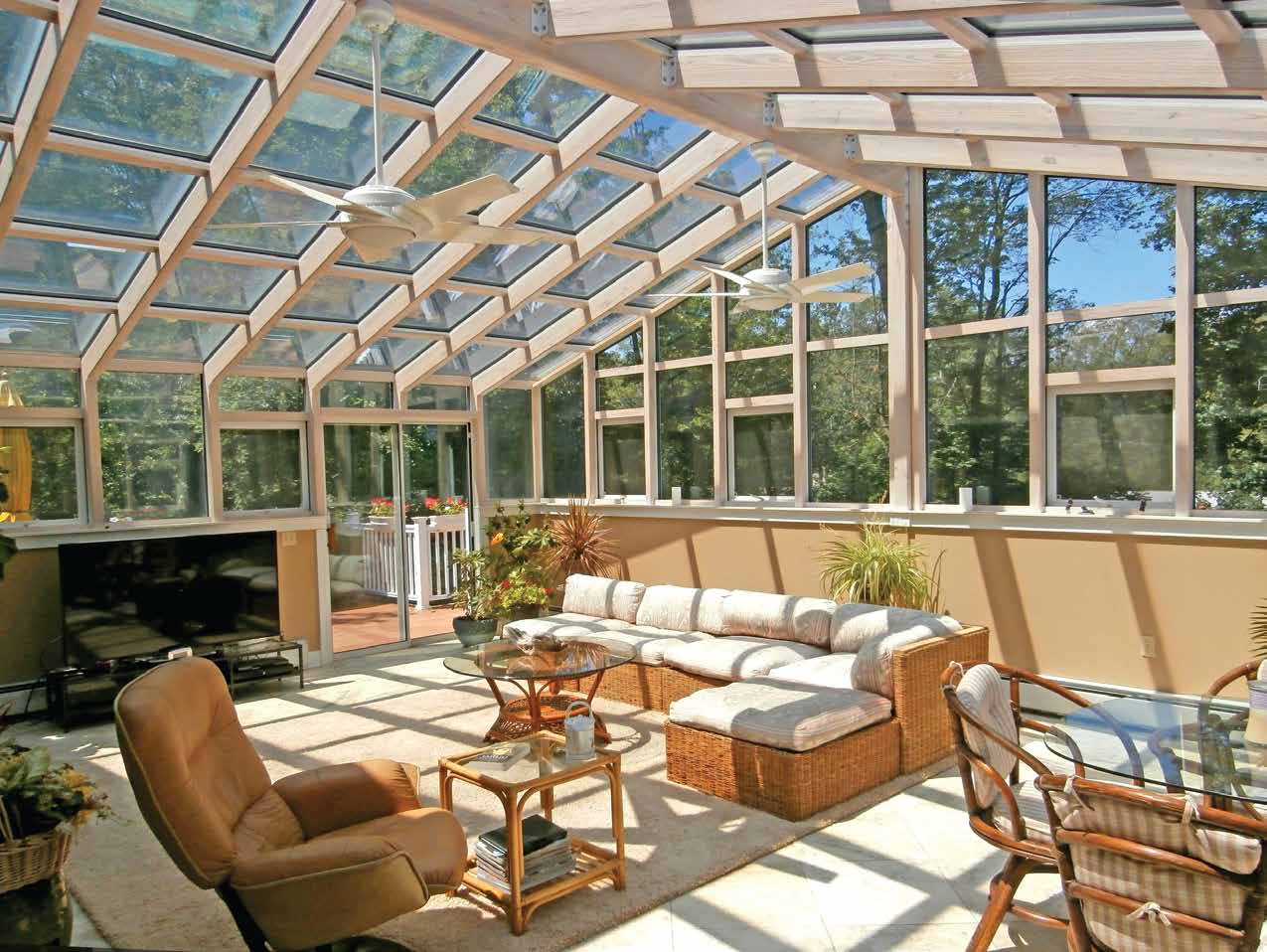 Illustrative image of a glazed sun room with a lounge setting